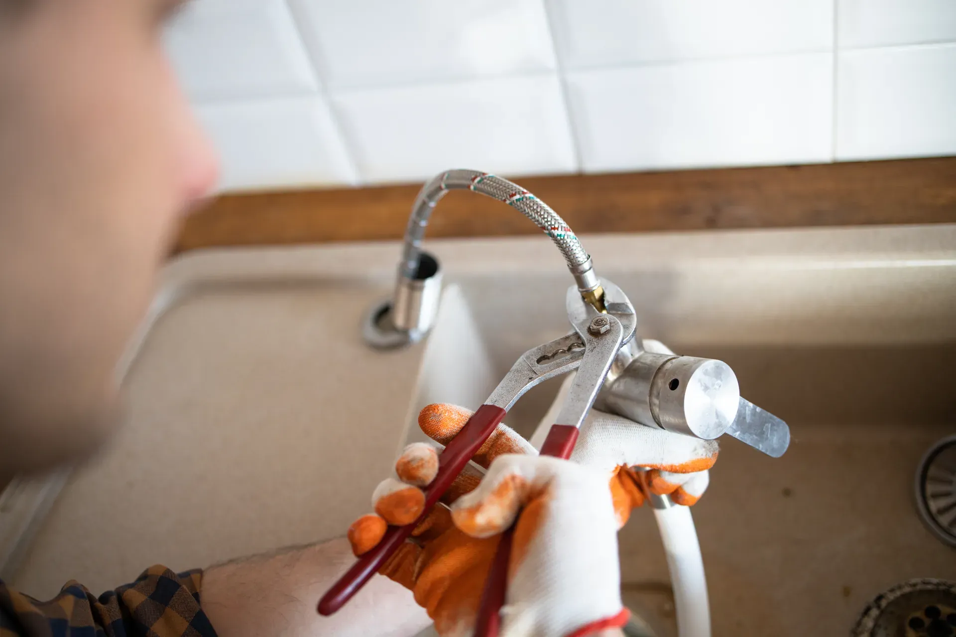 Photo of a dripping kitchen faucet